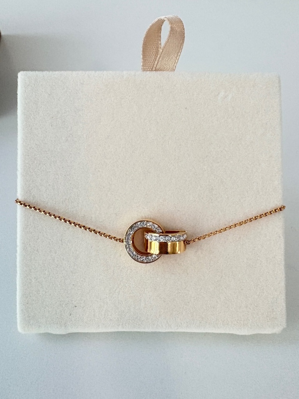 Swarovski Hollow Interlocking Circles Bolo Bracelet in Rose Gold Tone